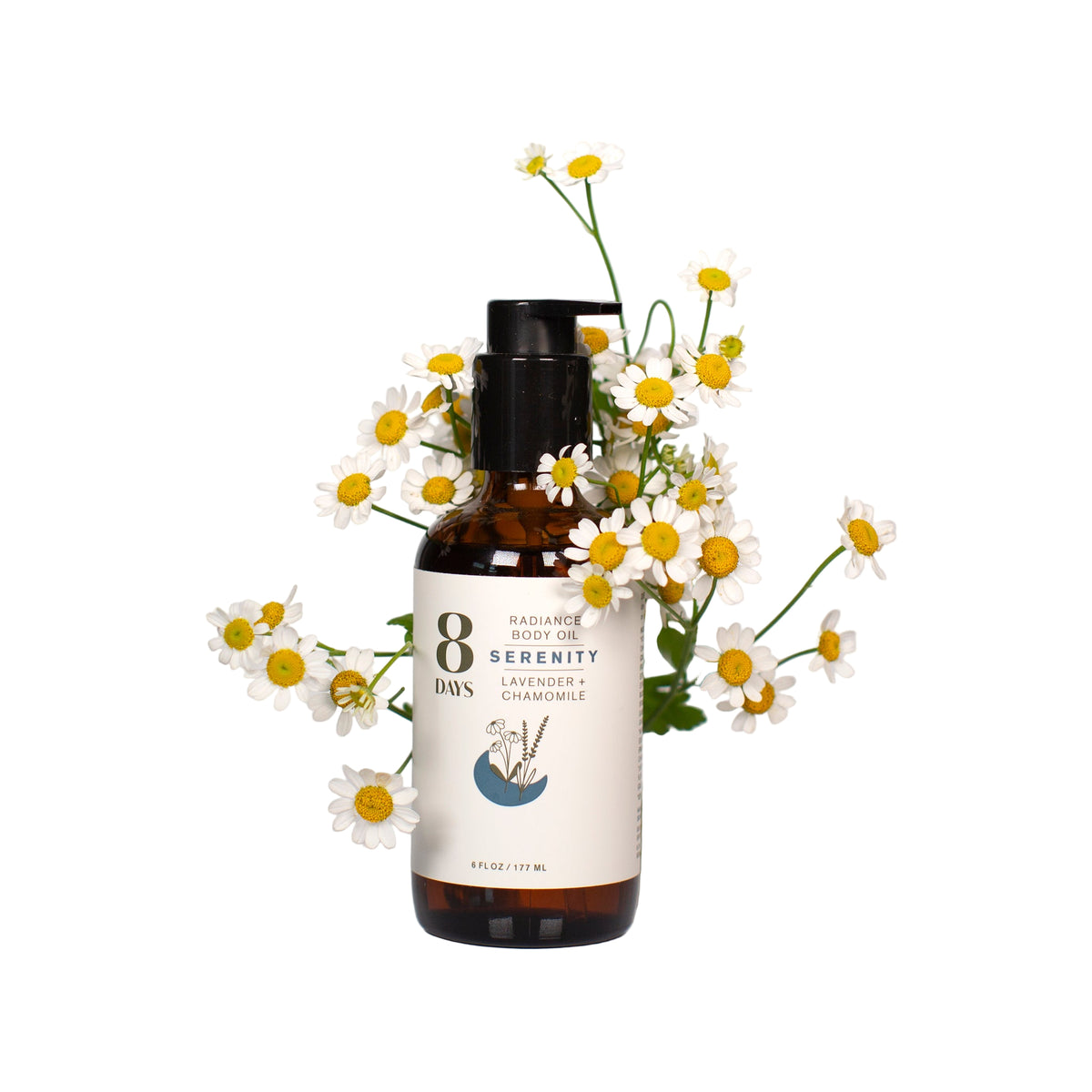 Bottle of '8 Days Serenity' with flowers on a light background