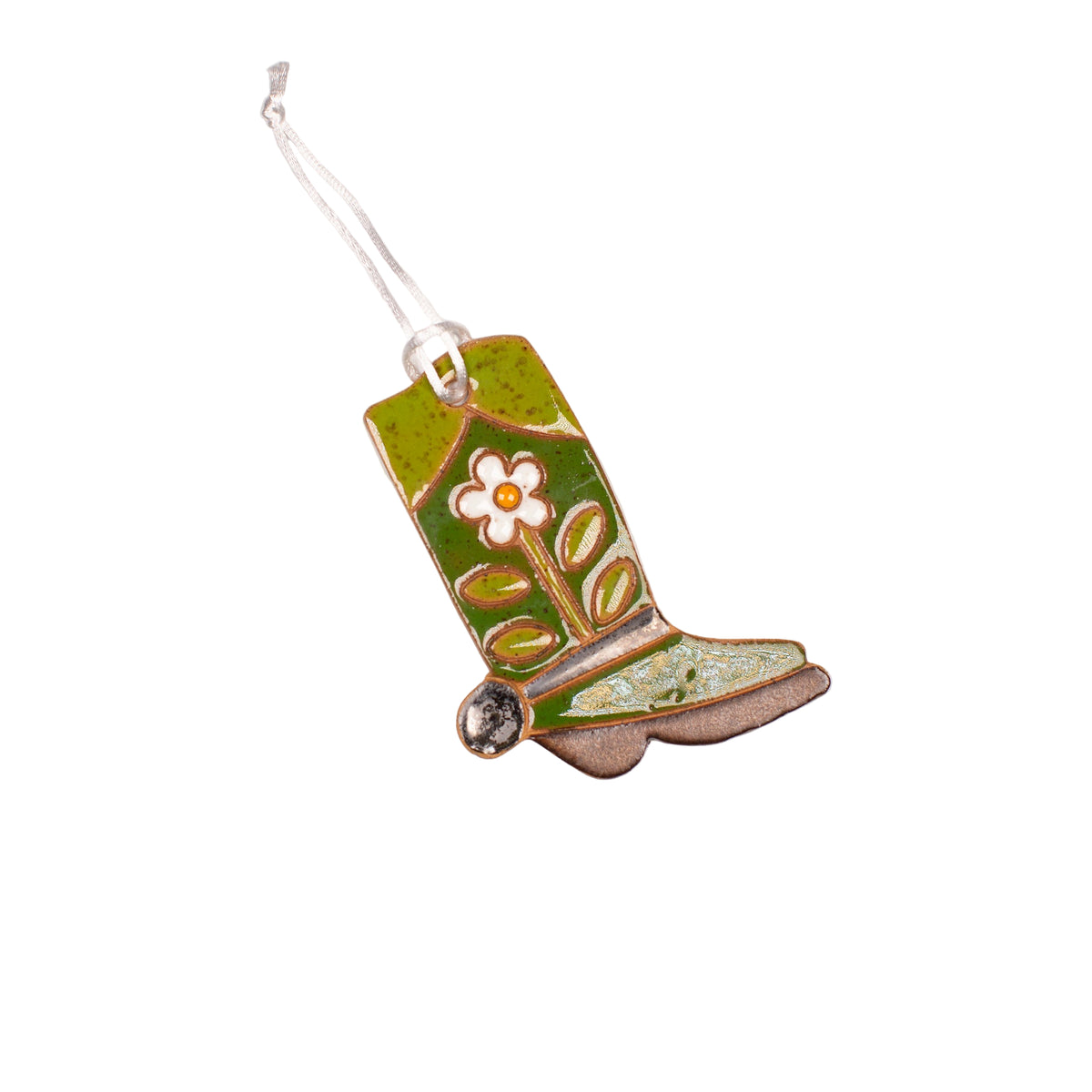 Decorative green boot ornament with floral design on a white background