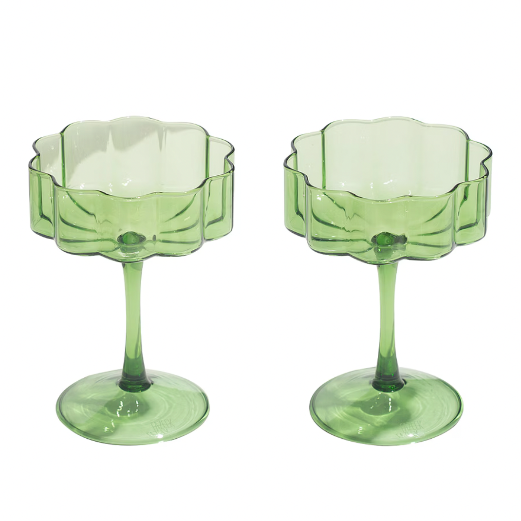 pair of green hand blown coup glasses