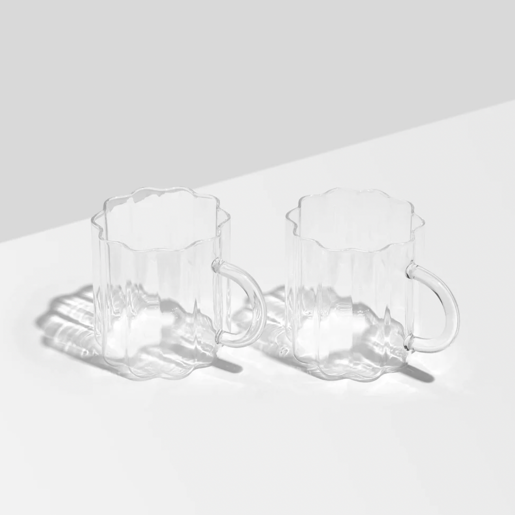 Clear glass hand blown tea or coffee mugs with a scalloped pattern