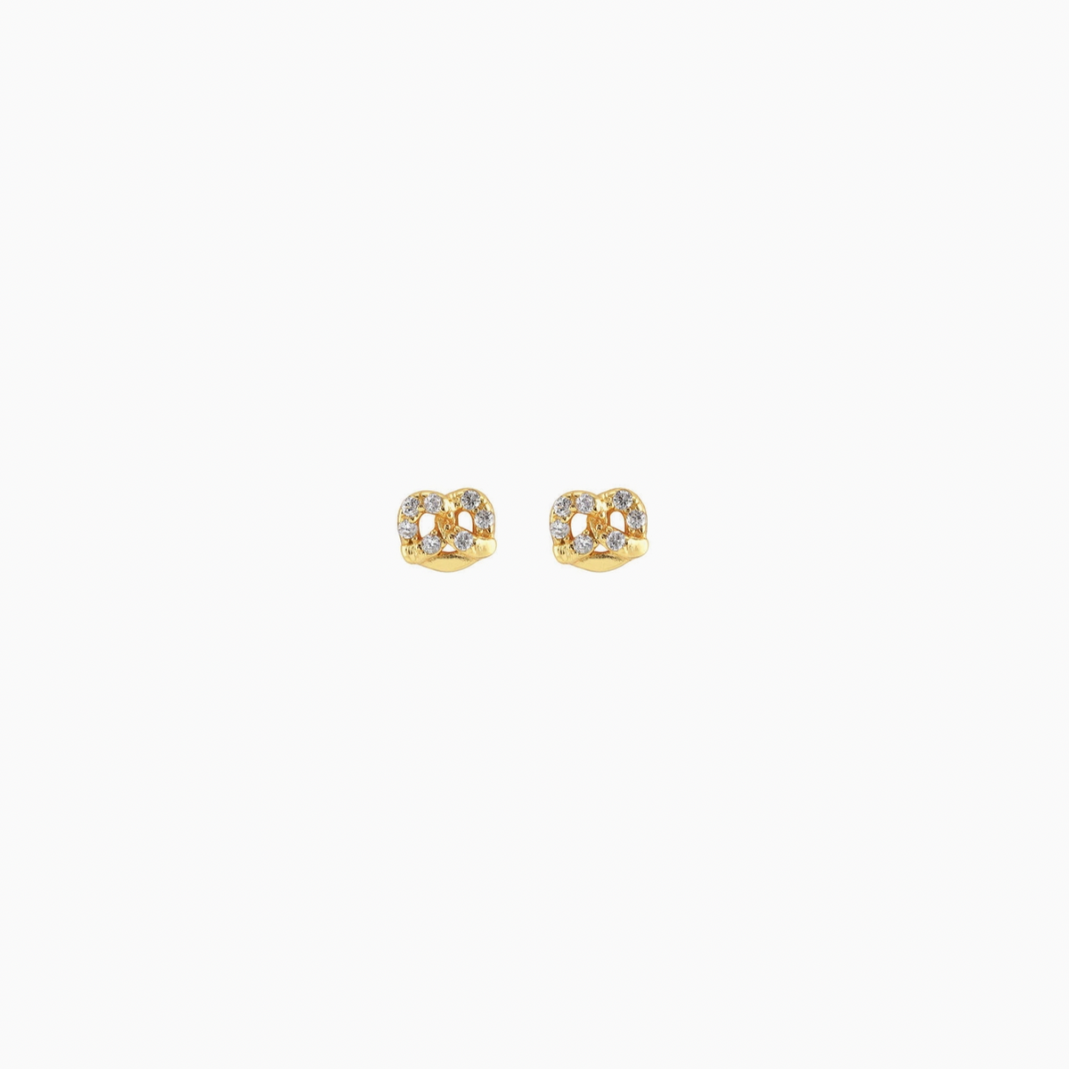 Gold pretzel earrings with small diamonds on a white background