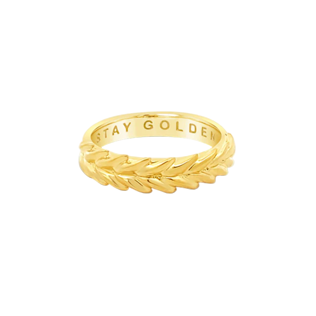 Gold vermeil ring with 'Stay Golden' engraving on a white background