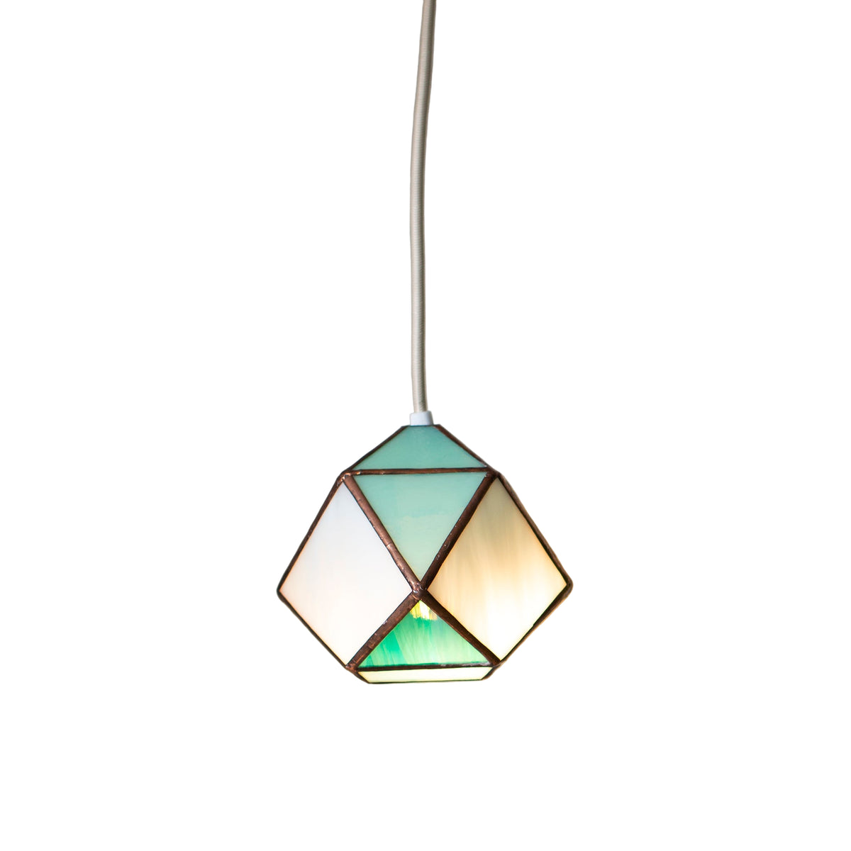 Geometric stained glass pendant light with stained glass design on a neutral background
