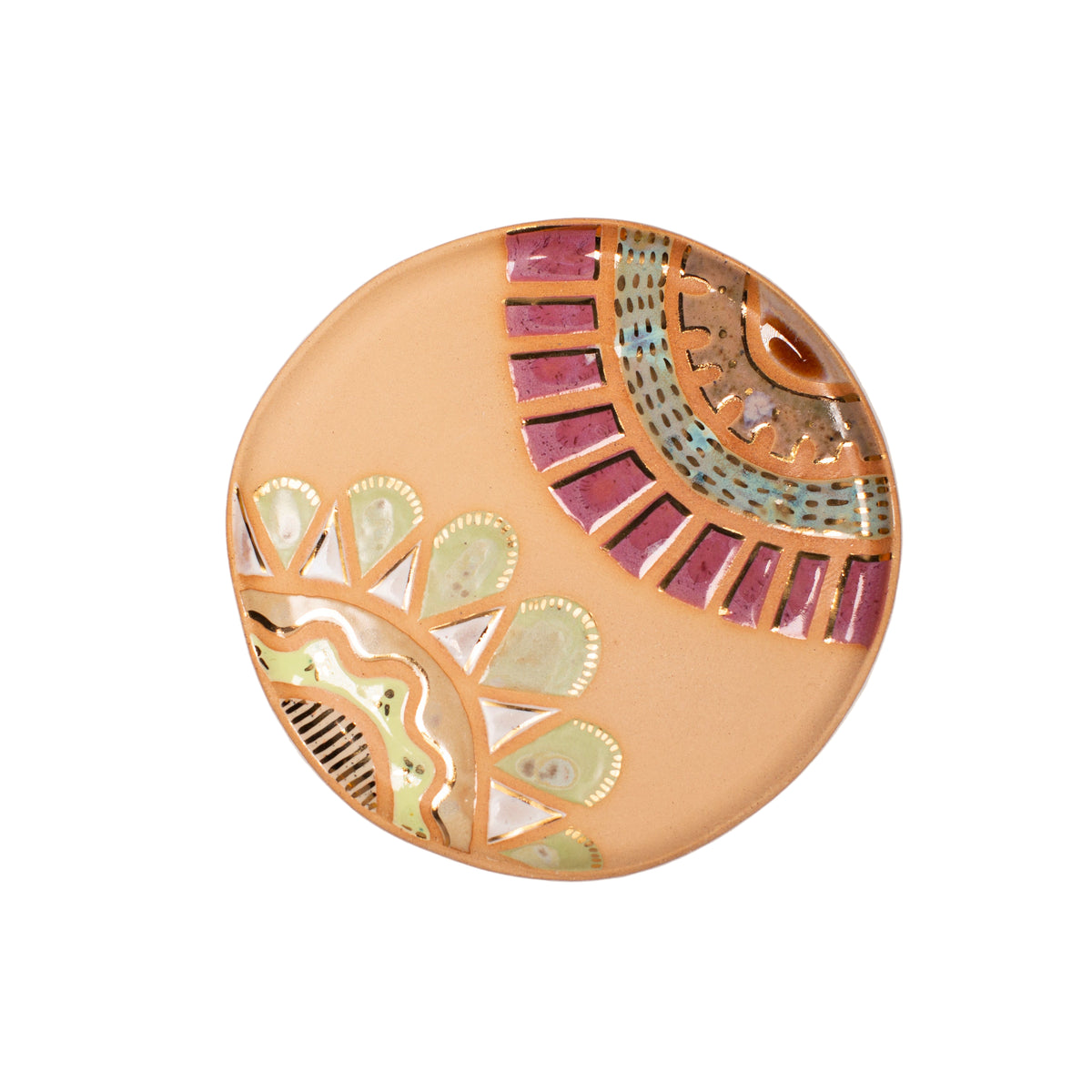 Decorative stoneware plate with geometric design on a white background