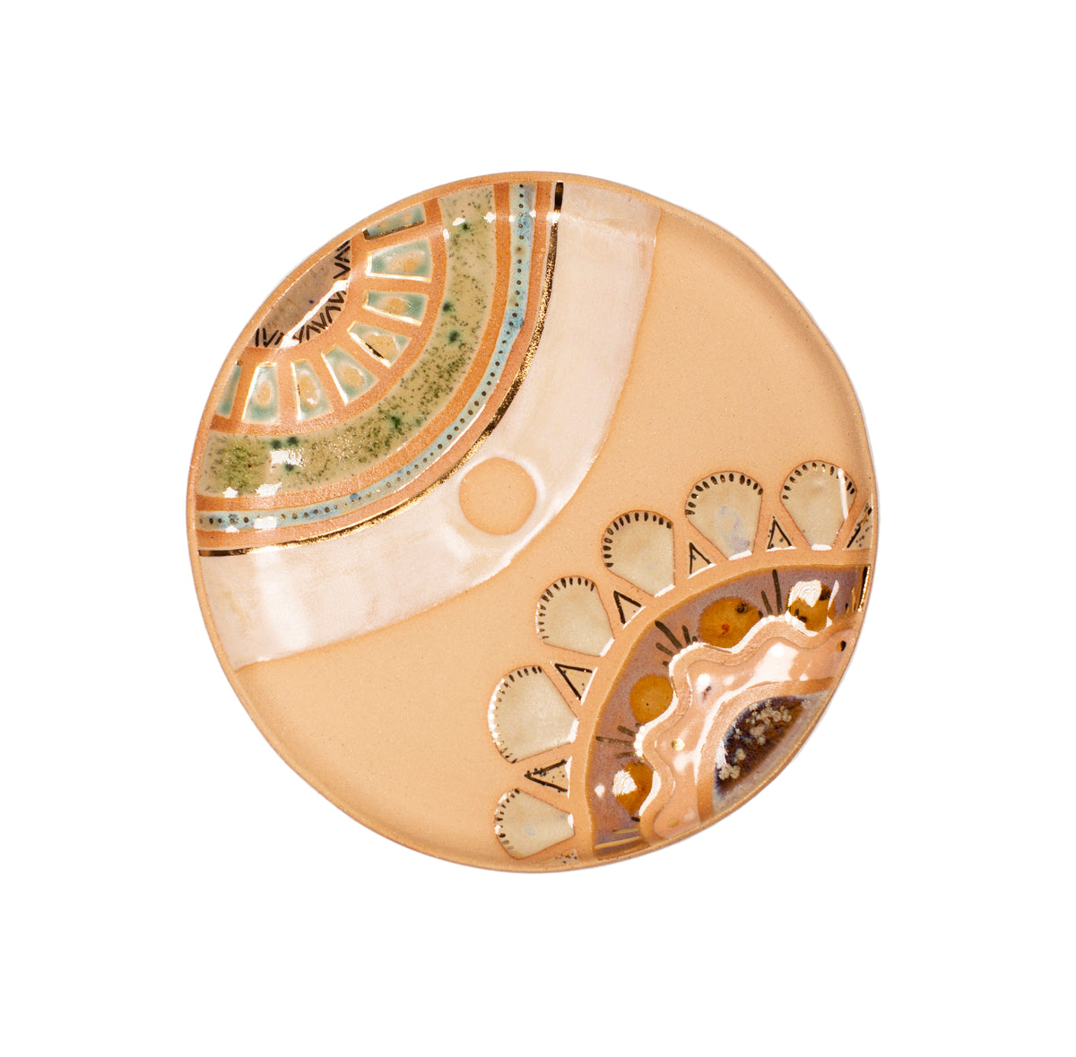 Decorative stoneware plate with geometric design on a white background