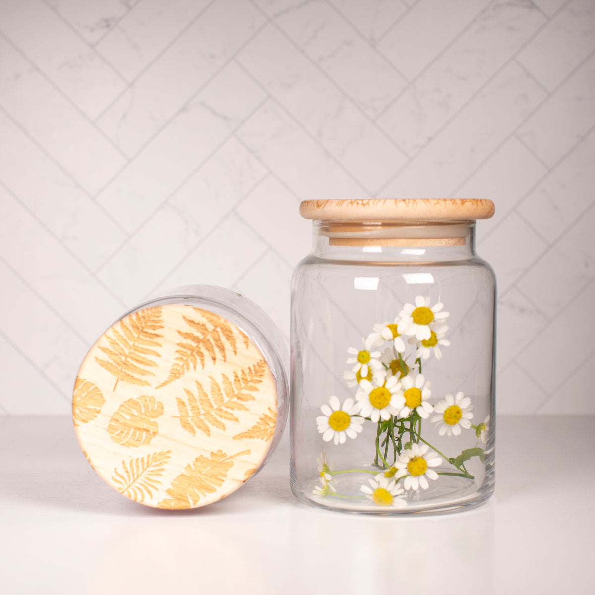 glass jar with etched floral wooden lid