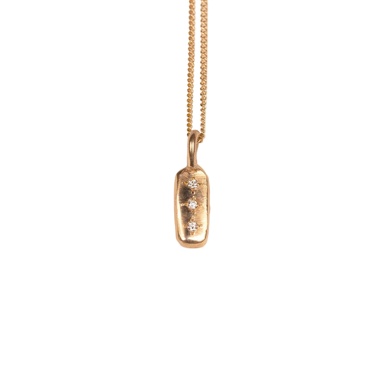 Gold necklace with a pendant on a white background
