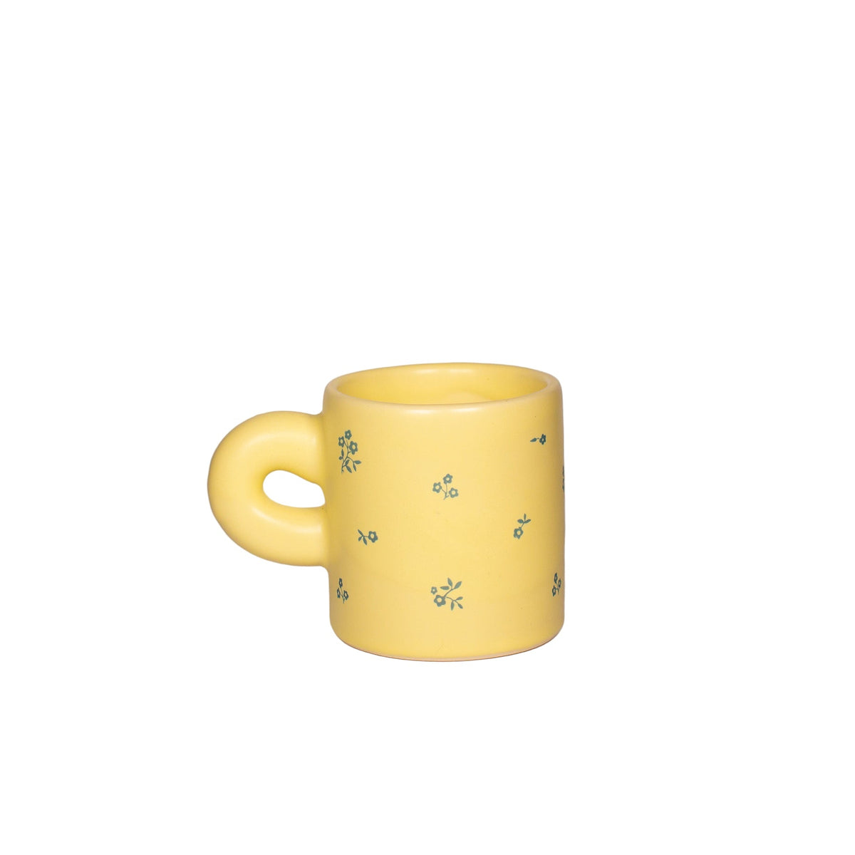 handmade Yellow mug with floral patterns on a white background