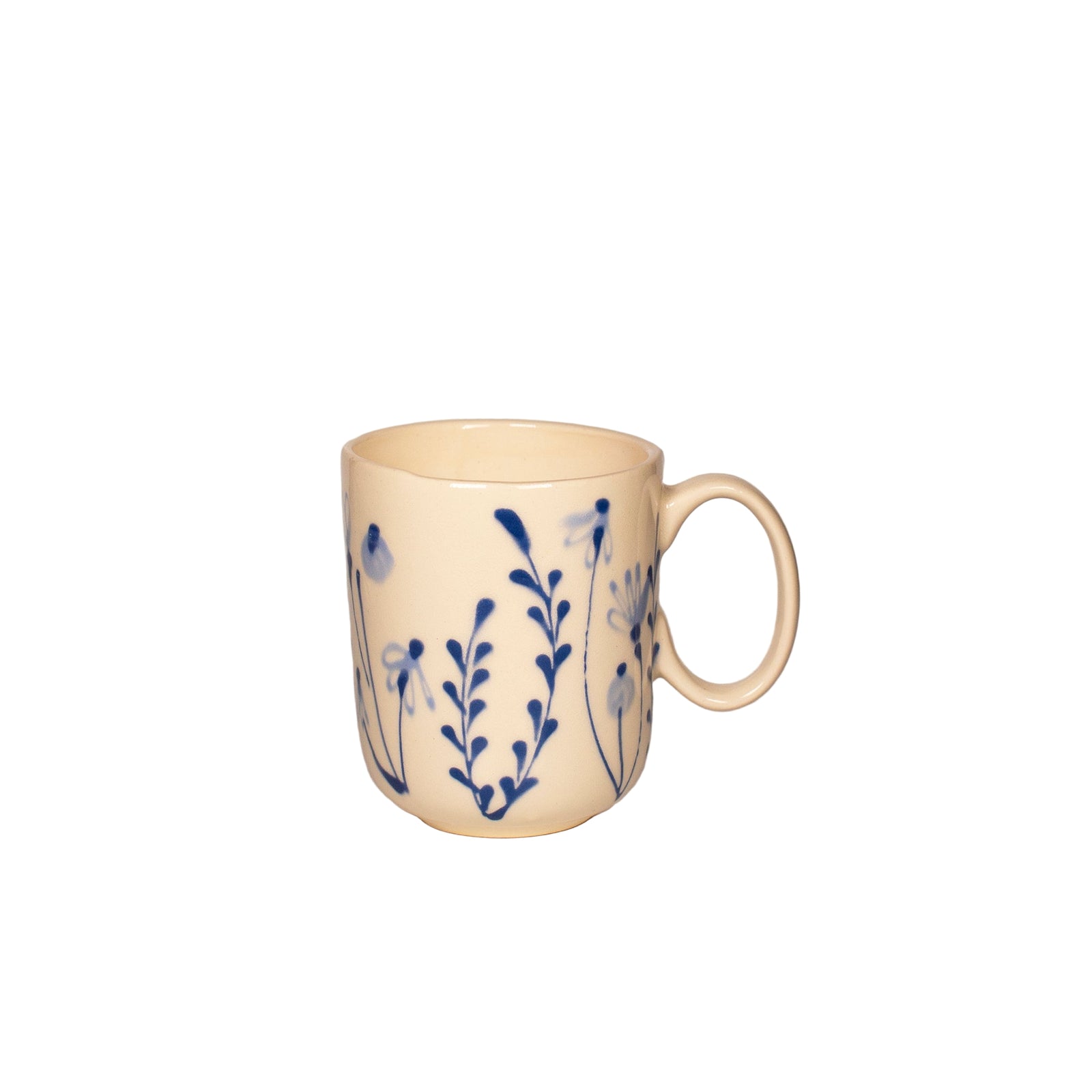 cream colored handmade mug with handpainted blue wildflowers 